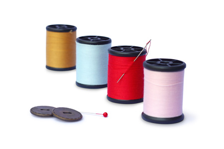 colorful sewing Threads isolated on white 