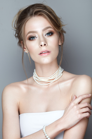 Perfect Model with Beautiful Makeup and Hairstyle. Bride Girlの写真素材