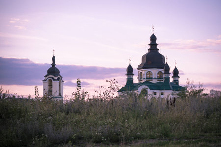 Vishneve, Ukraine-August 19 2012 -Beautiful sunset over the Christian church in the suburbs of Kiev city of Vishneve in Ukraineの写真素材