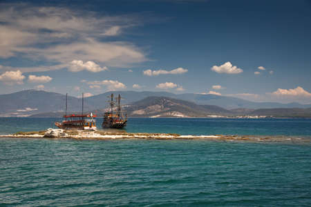 DIDIM, TURKEY â SEPTEMBER 6, 2016-Two sea yachts with tourists on board anchored near the coast of eastern Turkey in order to give tourists the opportunity to enjoy marine life and take a dip in the Aegean Seaのeditorial素材