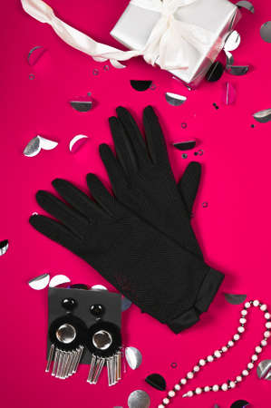 Womens fashion accessories on a pink background with copy space. Beauty and fashion concept.の写真素材