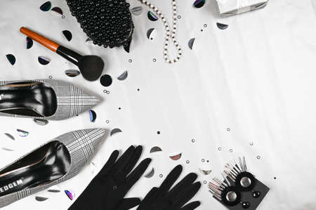 Womens accessories on a light background with copy space. Time to party concept.の写真素材