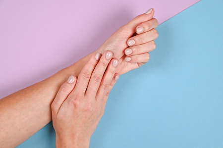 Classic natural nails, gel polish, perfect clean manicure.の写真素材
