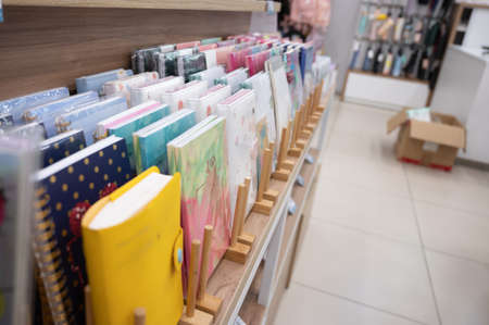 Notebooks on the shelf of the stationery store. High quality photoの写真素材