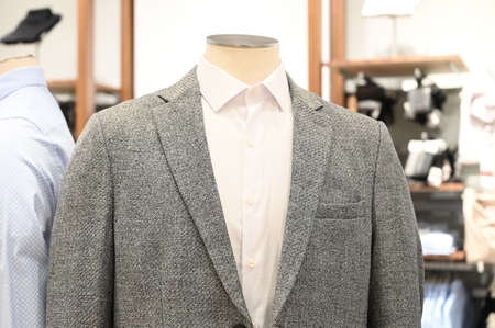 Suit for men in a fashion store showroom. Men shop, men clothes in the shopping mallの写真素材