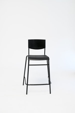 Modern black chair isolated on white. vertical photo.の写真素材