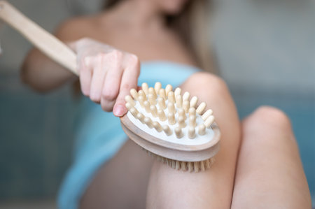 Massage of the body with a dry brush. Anti-cellulite massage. Prevent and treatment cellulite and body problemの写真素材