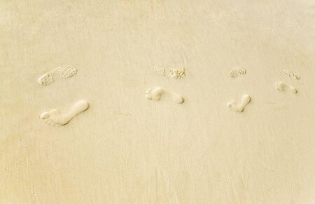 Footsteps at the sand on the seasideCounter Pathの写真素材