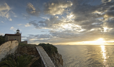 View of the lighthouse during sunrise in Paralio Astrosの写真素材