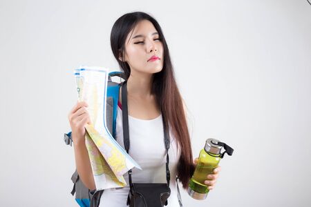 Beautiful woman traveler - on white backgroundの写真素材