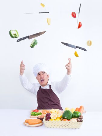 Chef cooking with magic concept - on white backgroundの写真素材