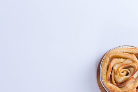 Mini apple rose pie - on white backgroundの写真素材
