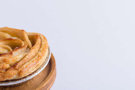 Mini apple rose pie - on white backgroundの写真素材