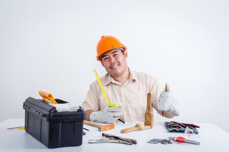 portrait of male technician on white background