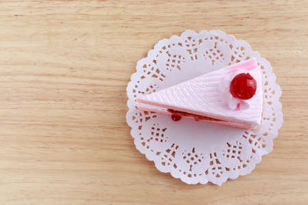 Strawberry cake with cherry on topの写真素材