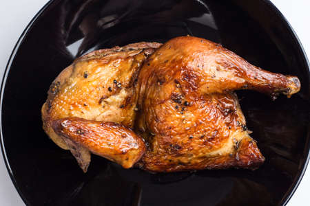 Roasted chicken on white backgroundの写真素材