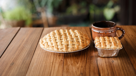 Coffee and Coconut pie on wooden table