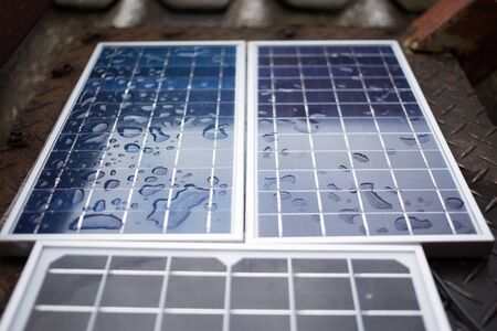 Close-up Solar panels (solar cell) with water drop after the rain.の写真素材