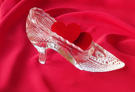 Two red hearts are in crystal shoeの写真素材