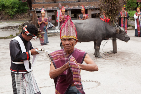 SUMATRA, INDONESIA - AUGUST 22.2012: ritual dance of Batak people on Lake Toba.のeditorial素材