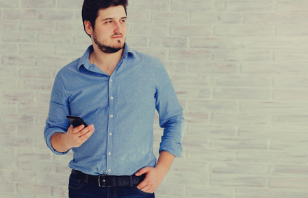 Man and phone in Studioの写真素材