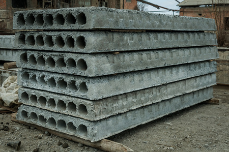 the concrete slab lying in the warehouse in stacks