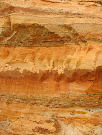 Wall sand pit with a cross-sectional view of the layers
