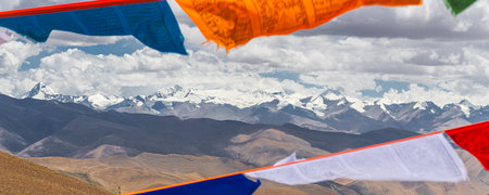 Prayer Flags and the range of Himalaya Mountains in in the background