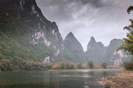 The shores of the Li river in Xing Ping, Guilin, Chinaの写真素材