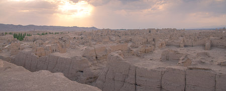 Jiaohe Ancient Ruins in Turpan range is a natural fortress located atop a steep cliffの写真素材