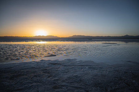 A beautiful shot of the Chaka Salt Lake during the sunset in Qinghai, China, close up on the saltの写真素材