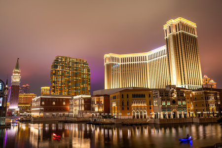 Venetian Macao by night, golden colors of this resort and Casino at night seen from Galaxy Cotai Stripの写真素材