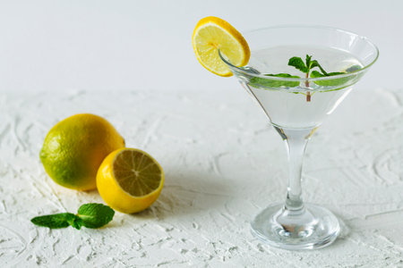 alcohol drinks. Martini glass with cocktail and ice on white background. Cocktail Margarita with...