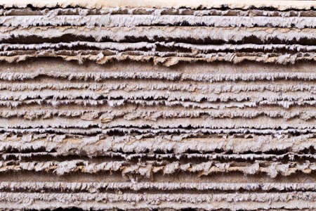 paper corrugated cardboard for packing. abstract texture background horizontal lines with beige color. patternの写真素材