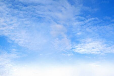 Beautiful blue sky on a nice day. White, light clouds.の写真素材