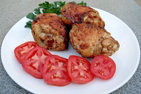 Skewers of chicken thighs with tomato and herbs. Barbecue, Kebabの写真素材