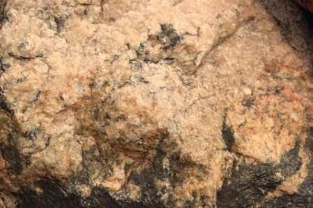 background, texture. Natural stone granite. multi-colored - red, gray brown beige blackの写真素材