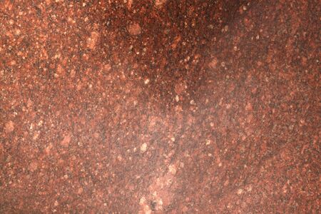 Background.Texture. Natural polished stone, tile for wall or floor. Red granite.の写真素材
