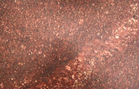Background.Texture. Natural polished stone, tile for wall or floor. Red granite.の写真素材