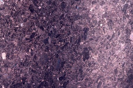 Background.Texture. Natural polished stone, tile for wall or floor. Red granite.の写真素材