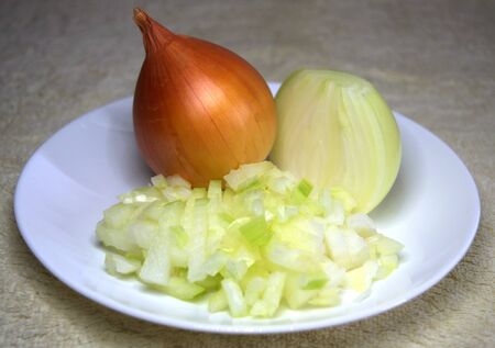 Onions. Whole, half and chopped for cooking.の写真素材