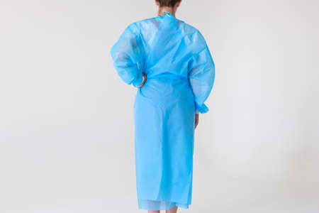 Disposable medical uniform protects against viruses and bacteriaの写真素材