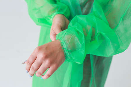 Disposable medical uniform protects against viruses and bacteriaの写真素材