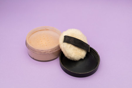 Facial Powder on Purple Background
