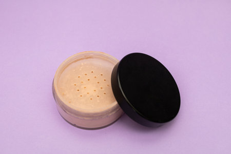 Facial Powder on Purple Background