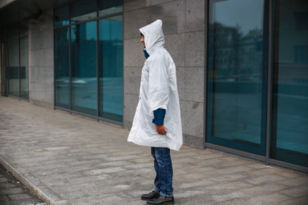 Raincoat on a man, shooting outside