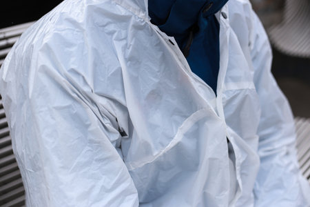 Raincoat on a man, shooting outside