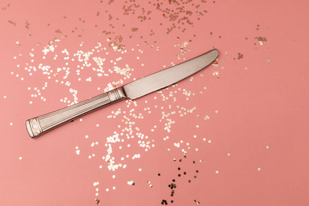 Kitchen knife on pink backgroundの写真素材