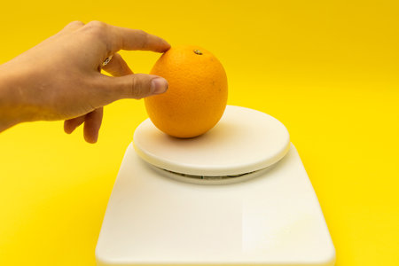 Small kitchen scales for vegetables, fruits and cerealsの写真素材