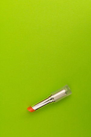 Green lipstick on green background, monochromeの写真素材